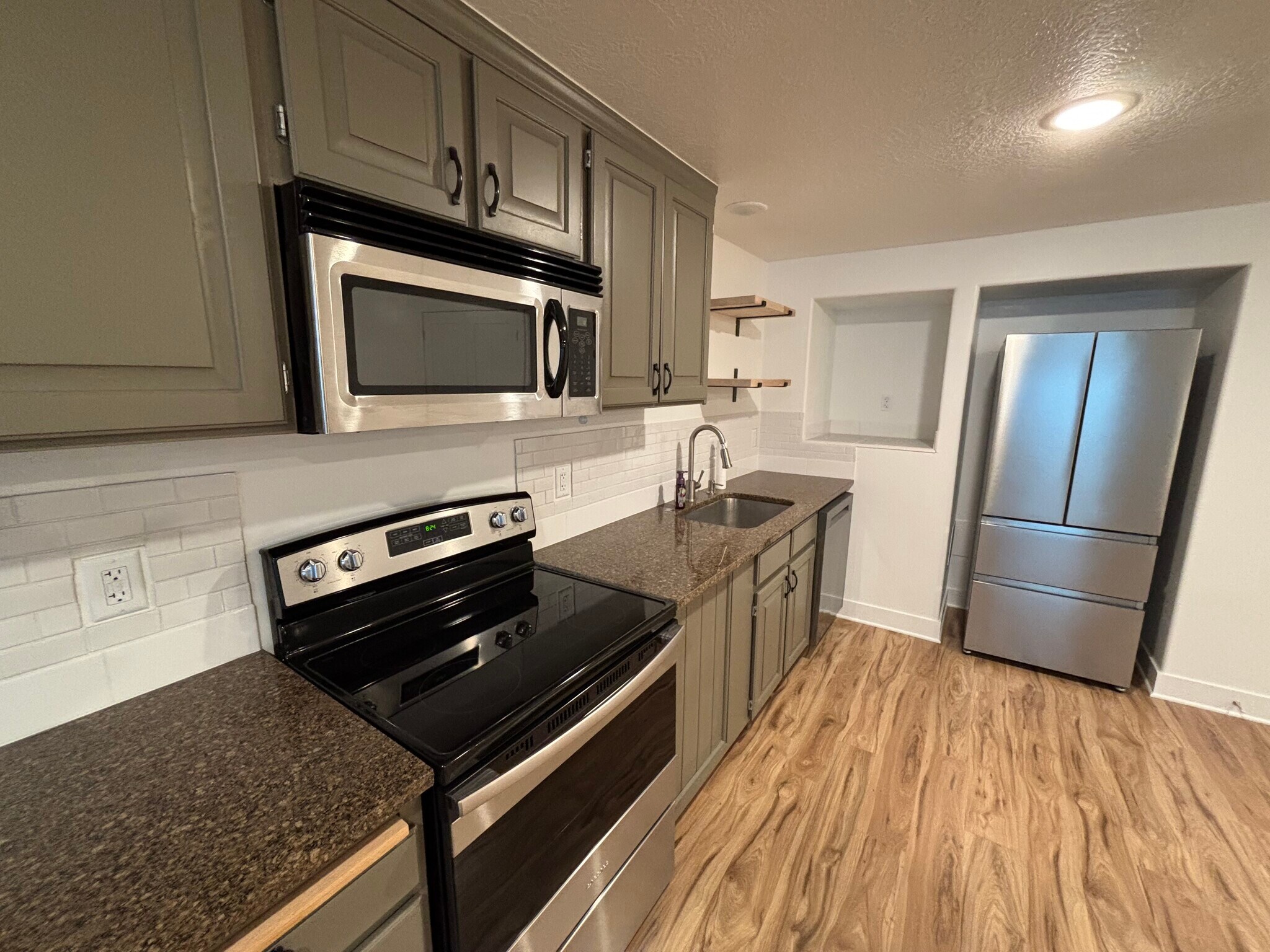 Kitchen- appliance station and fridge - 188 E Bruin Dr