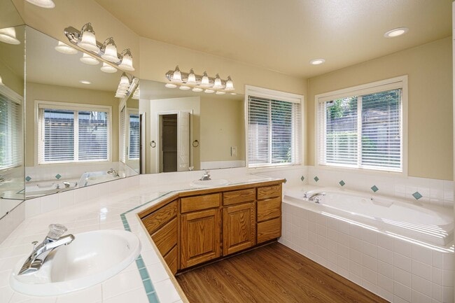 Building Photo - Beautifully Landscaped 1/4 acre with Well Maintained 4 bedroom 2 Bath Home with 3 Car Garage