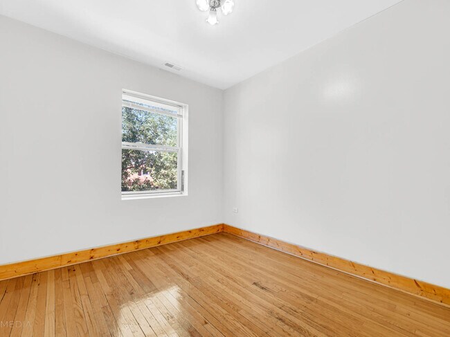 Building Photo - 7757 S Throop St