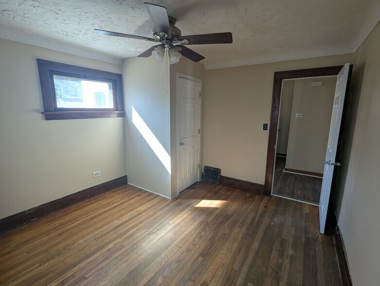downstairs bedroom - 2401 Natchez Ave