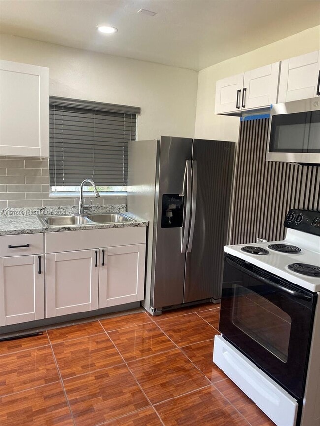 Building Photo - 10701 NW 23rd Ave