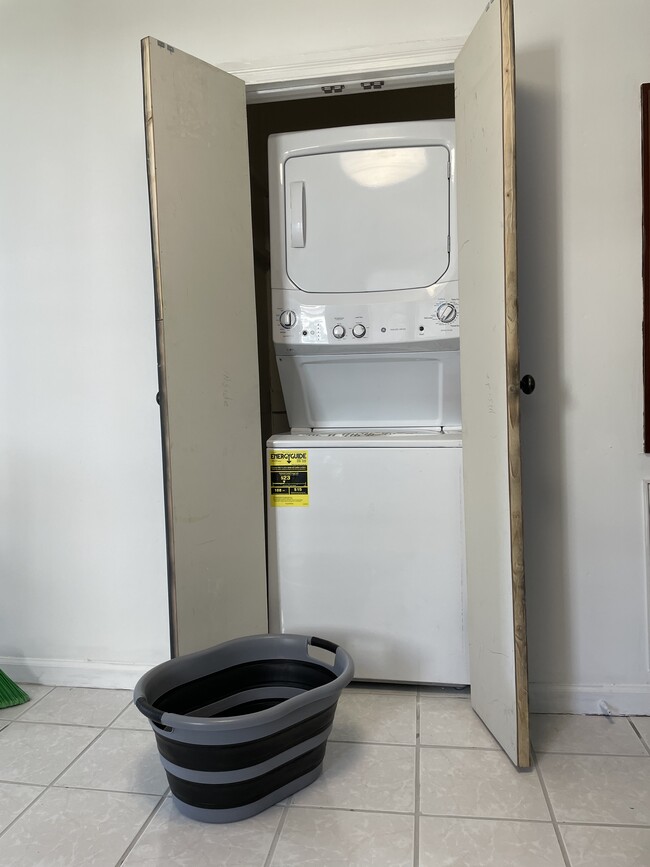 In unit washer and dryer with collapsible laundry basket. All Laundry supplies provided - 1007 E Unaka Ave