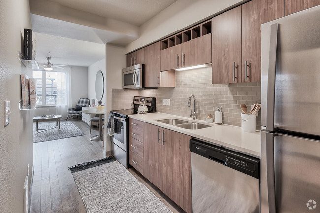 Kitchens feature built-in microwaves and stainless steel appliances - Platform 14