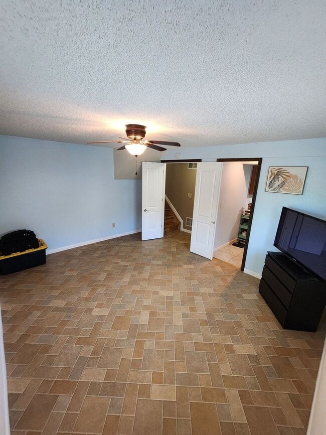 Building Photo - Spacious 4-Bedroom Home with RV Parking in...
