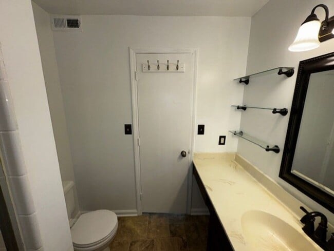 Building Photo - Charming 2-Bedroom Condo in a Peaceful, Tree-Lined Community – Minutes from Uptown Charlotte