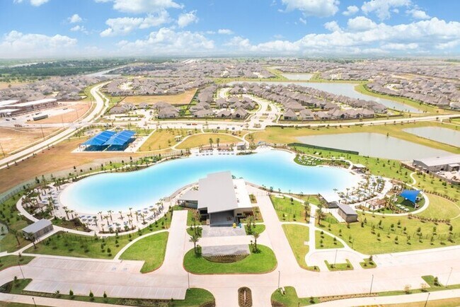 Building Photo - Now Leasing in Sunterra with Top-Tier Amenities