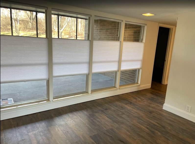 Front entry facing front patio. Floor to ceiling windows - 8514 Madrid Ct