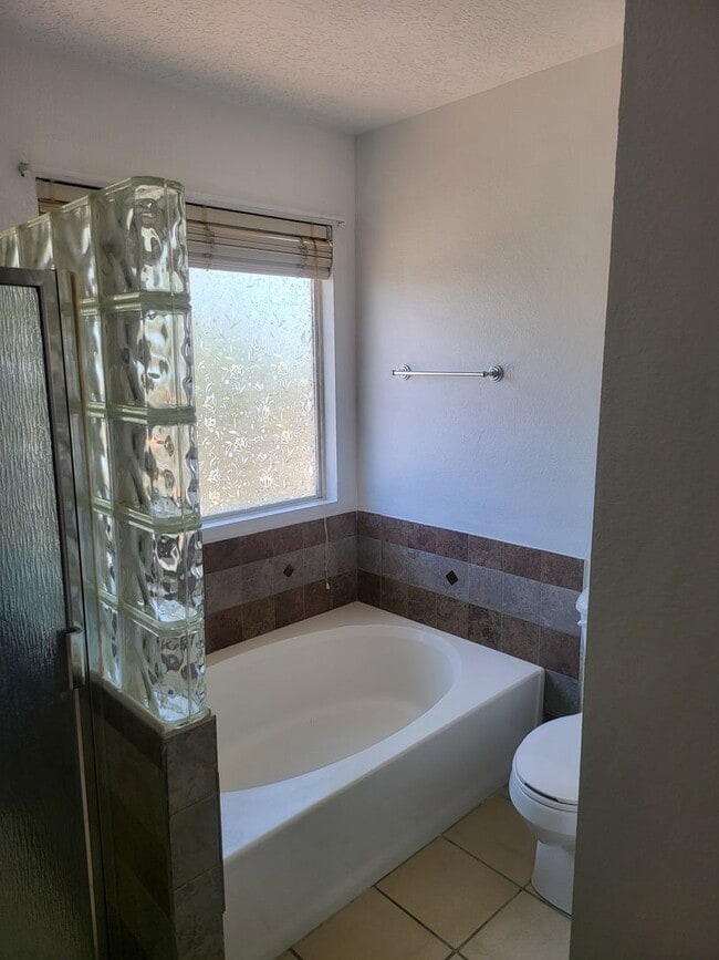 Building Photo - West Side 2/story 3 Bedroom 2 Bath & 2 Car...