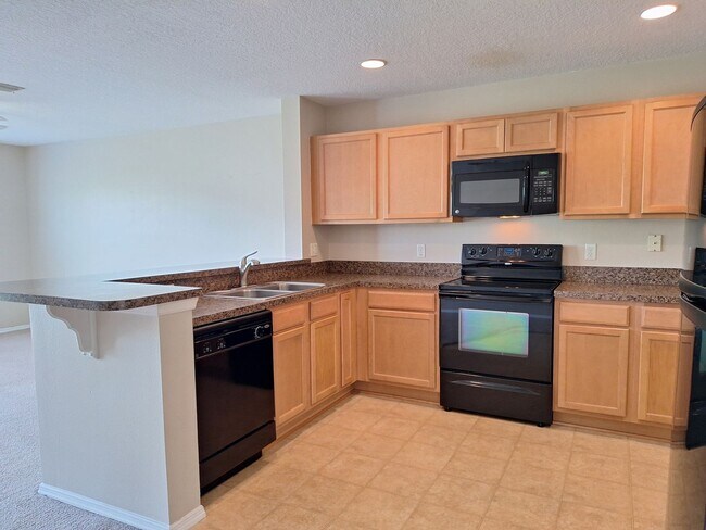 Building Photo - 2BR 2.5BA LANDINGS AT SUGAR MILL TOWNHOME