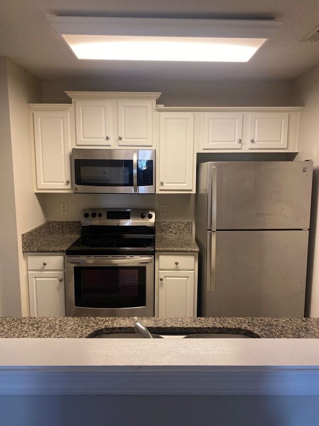 Building Photo - Harborview 2-Story Townhouse with Spacious Layout & Community Pool Access