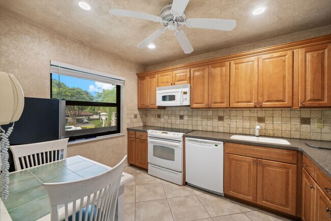 Building Photo - 21669 Tall Palm Cir