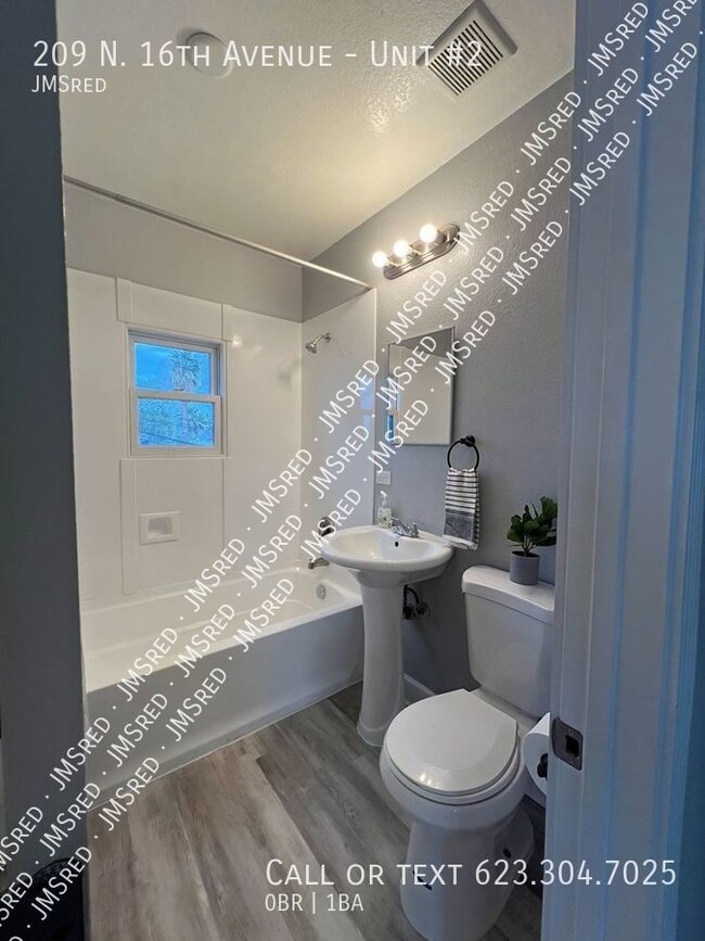 Building Photo - 209 N 16th Ave