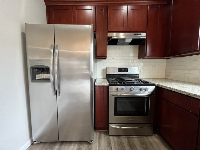 Building Photo - Well-Appointed 4BR/2.5BA Home with Spacious Living Areas & Modern Kitchen