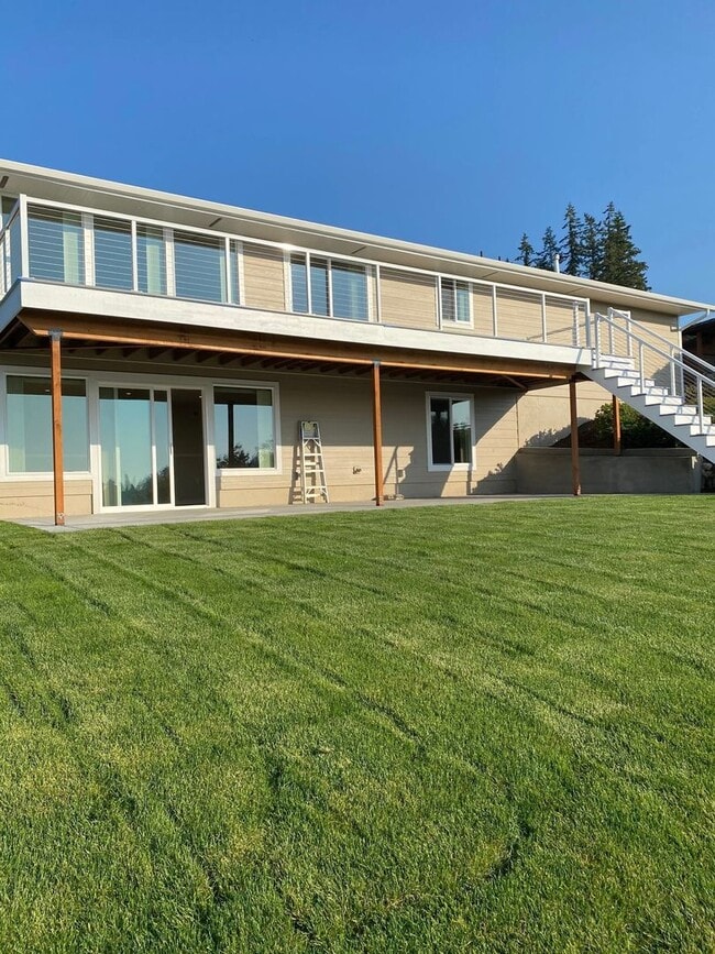 Building Photo - Modern 4-Bedroom Home with Panoramic Water & Mountain Views