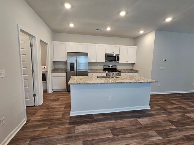 Building Photo - New 5 Bedroom/ 2.5 Bath Home