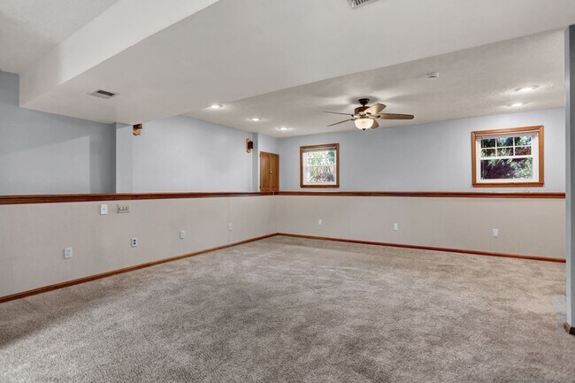Building Photo - Spacious 4-Level Home with Deck, Workshop ...