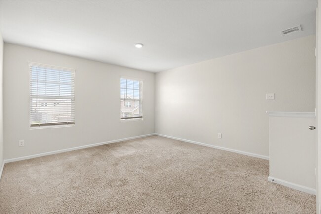 Building Photo - 7810 Pink Dahlia Dr