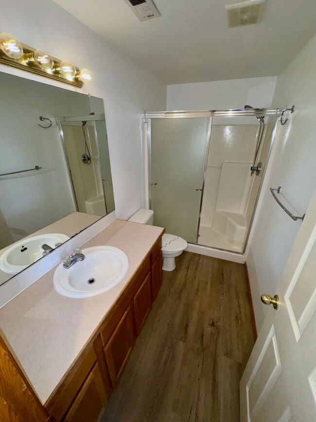 Building Photo - Spacious 4BR Home with Fenced Yard, 2-Car Garage & Convenient Location