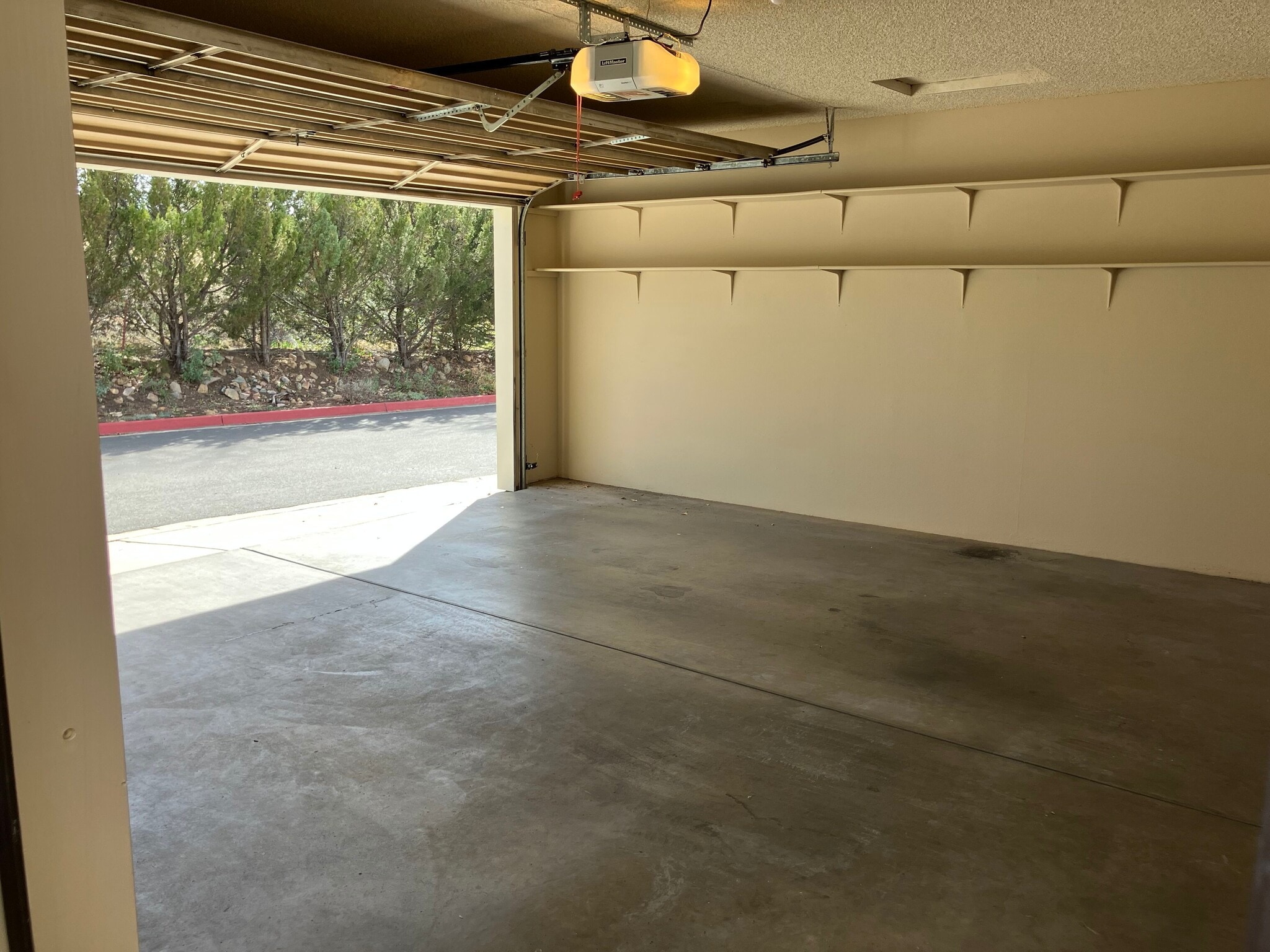 Garage from the Patio - 345 Rim Rock Cir