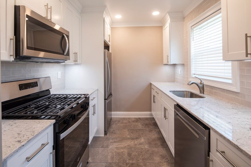 Interior Photo - Leonia Manor: In-Unit Washer & Dryer, Heat, Hot & Cold Water Included, Cat & Dog Friendly, and Wa...
