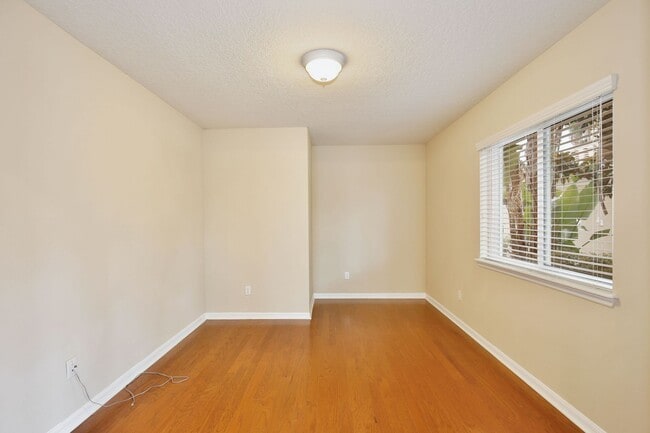Building Photo - AGENT SHOWINGS ONLY! Gorgeous 2/2 + Den Mediterranean Villa with Waterfront Screened Patio and 2-...