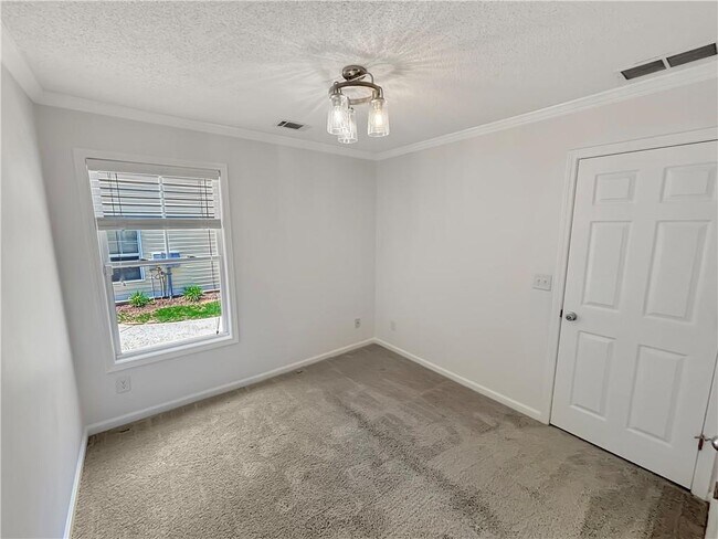 Building Photo - 3755 Pine Village Pl