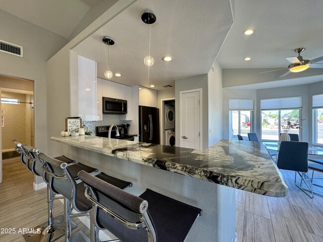 Building Photo - 8835 W Michelle Dr