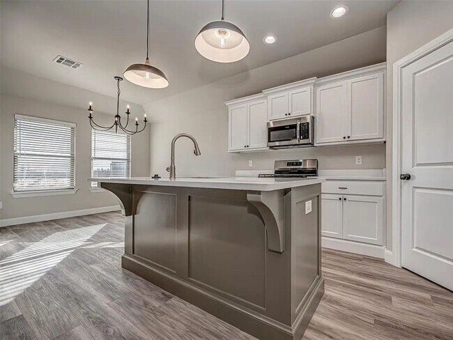 Building Photo - 4-Bed Home with Storm Shelter & 2-Car Garage in Mustang