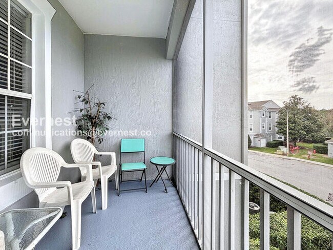 Building Photo - Modern 2-Bed Condo with Balcony / Furnished or Unfurnished / Pet Friendly / Available Now!