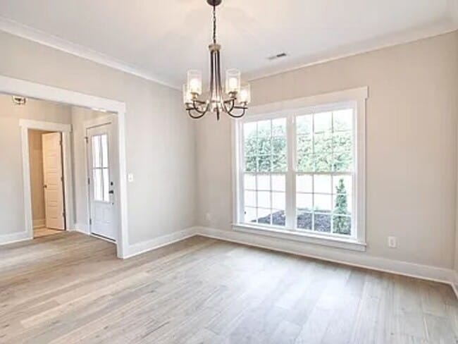 Building Photo - Situated on over 3 acres right in a growin...