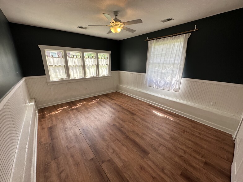 A large bedroom off the dining also receives tons of light - 1148 Pierce Rd