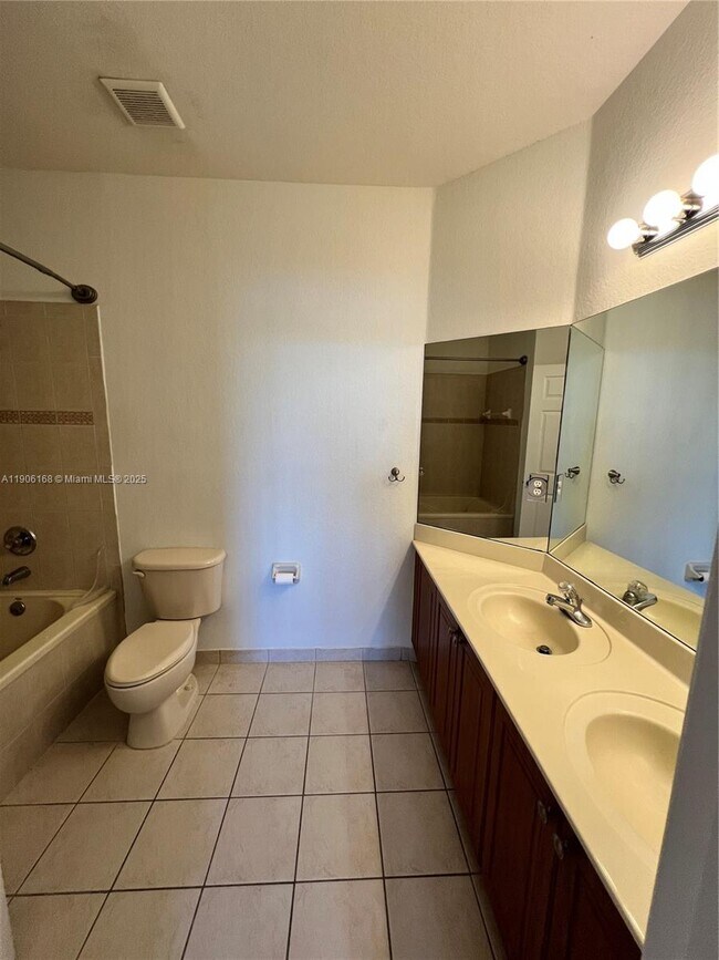 Building Photo - 10869 NW 79th St