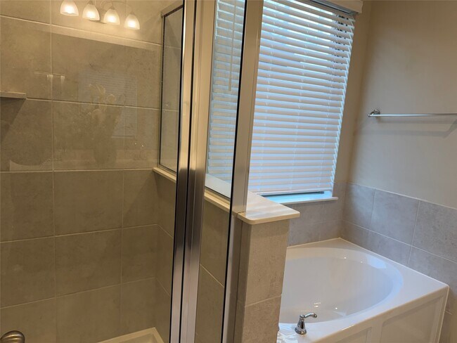 Building Photo - 8711 Windsong Trail Dr