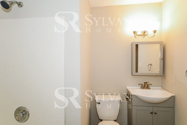 Building Photo - Cute, cozy and comfortable