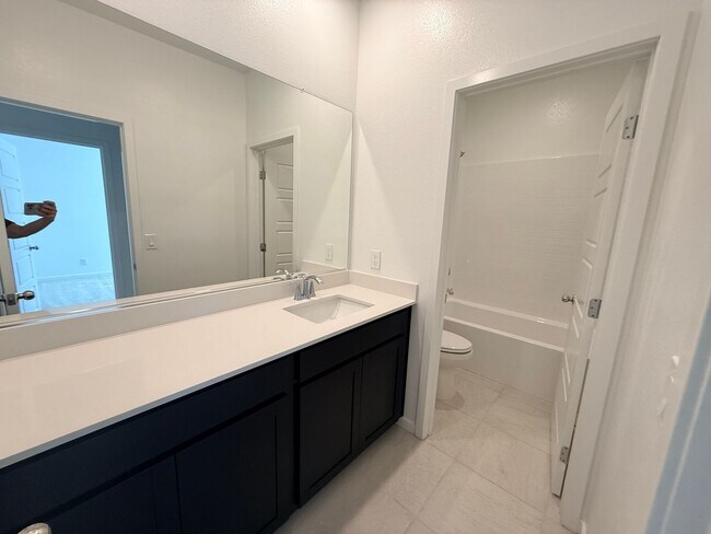Building Photo - Brand new, never-lived-in Lennar corner end-unit townhome offering exceptional natural light thro...