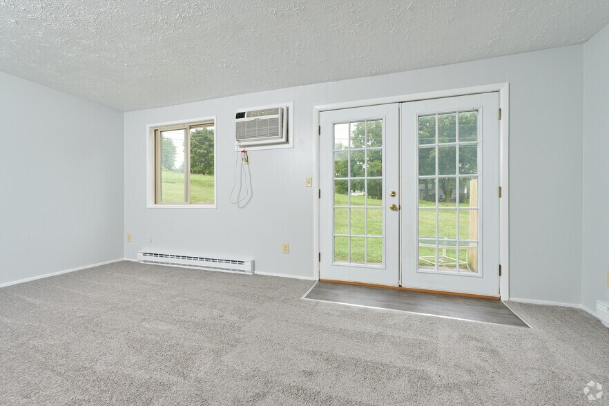 2 BR, 1.5 BA - 1330SF Living room. - Hilltop View Apartments & Townhomes