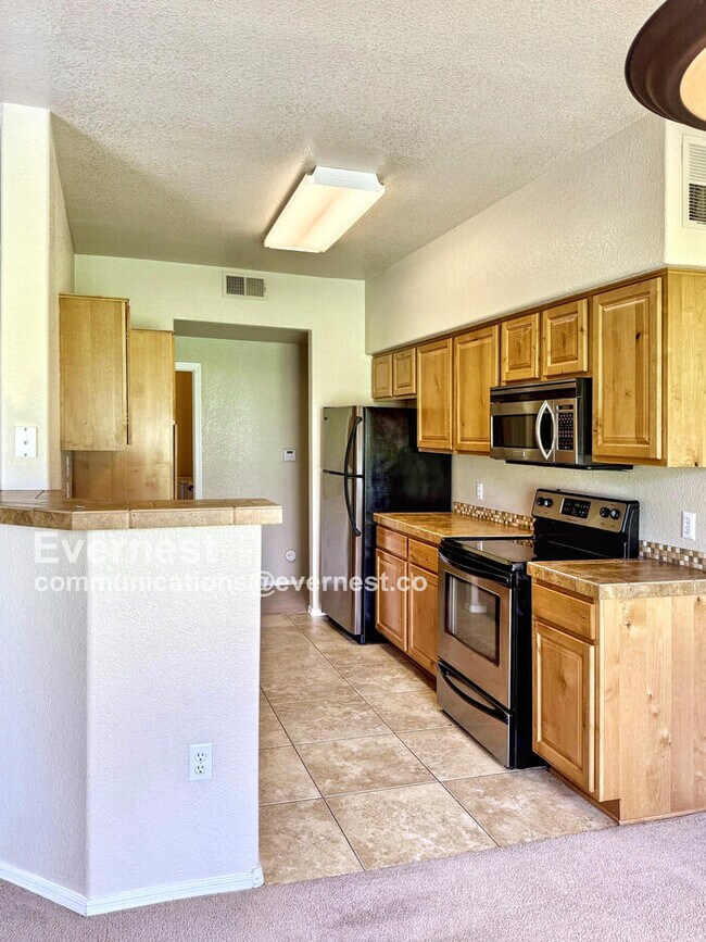 Building Photo - 7050 E Sunrise Dr