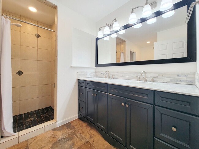 Building Photo - Spacious 4/BR 2.5/BA Two-Story Home with Fireplace & Huge Fenced Yard