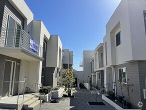 Building Photo - Brand New, Luxury Condos in the Heart of V...
