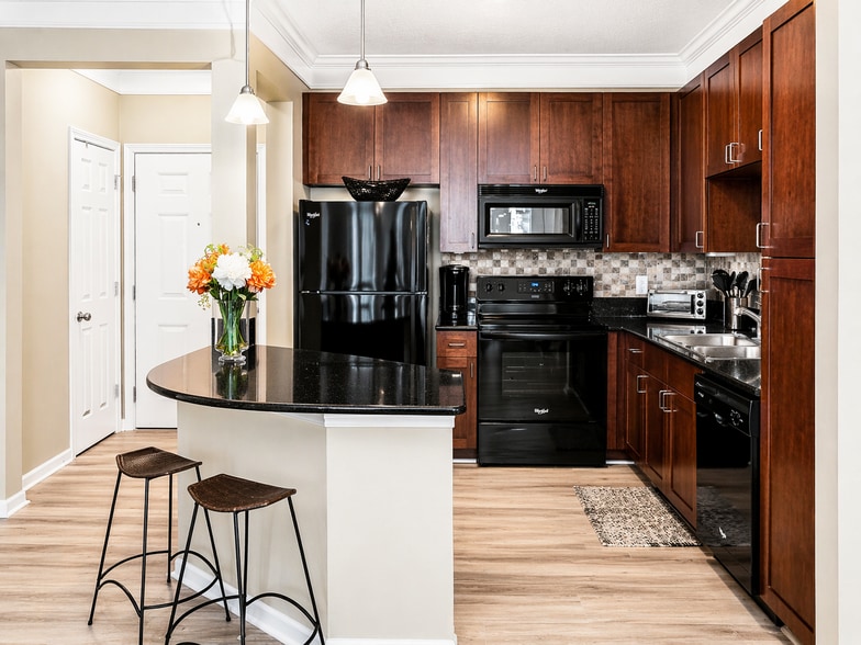 Open Kitchen with bar and applicances - 401 16th St NW