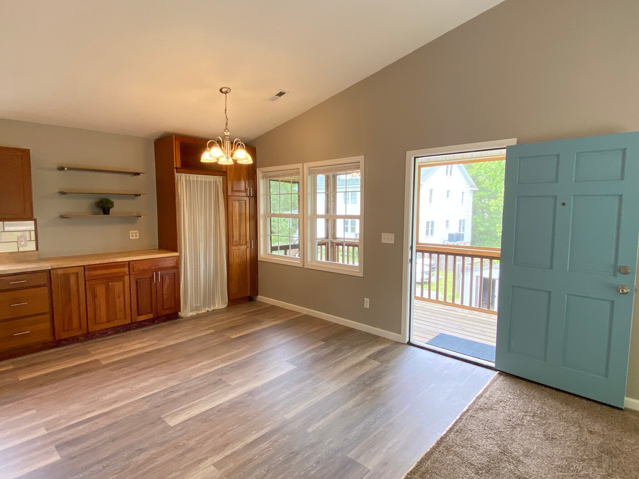 Kitchen, dining and windows to screened porch - 12 Brookside Cir