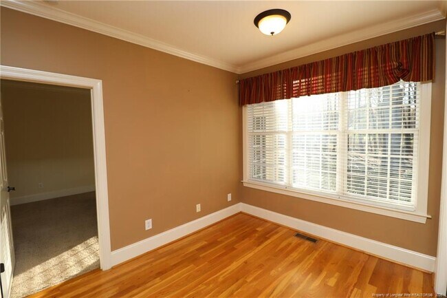 Building Photo - 7124 Blue Juniper Ct