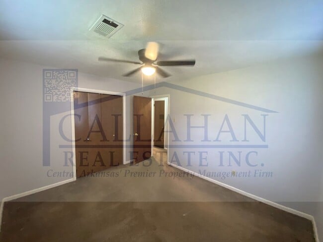 Building Photo - 8211 Woodview Dr N