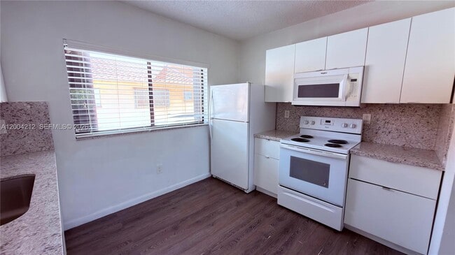 Building Photo - 6370 W 27th Ct