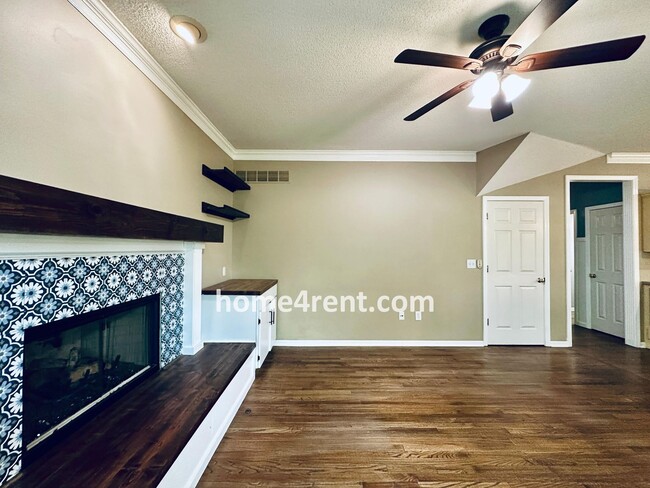 Building Photo - Blue Valley Schools w/ Wood Floors, Finished Basement and a Peaceful, Private Fenced Yard!