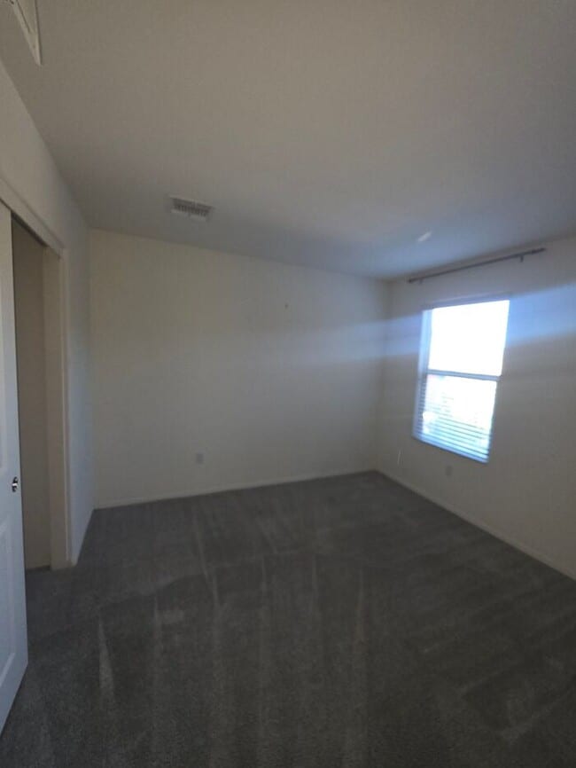 Building Photo - COMING SOON! New 3BR 2 BA Home w/ 2-Car Garage • Stainless Kitchen • Timer-Irrigated Yard in East...