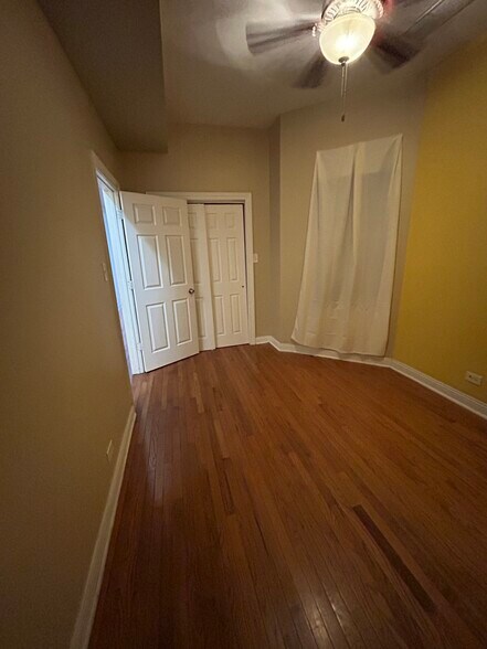 2nd Bedroom with soft sunshine accents wall - 6630 S Ingleside Ave