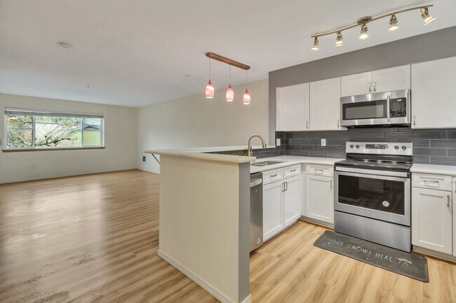 Building Photo - Two-Story Condo Near Delridge Library with Private Courtyard & Easy Downtown Access