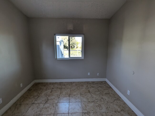 Other bedroom with view to deck - 3972 Ecochee Ave