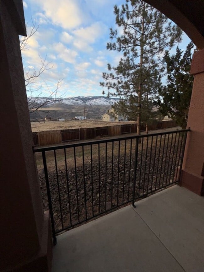 Building Photo - Discover Your Dream Condo with Stunning Mountain Views a 1 Car Garage & Covered carport in NW Ren...
